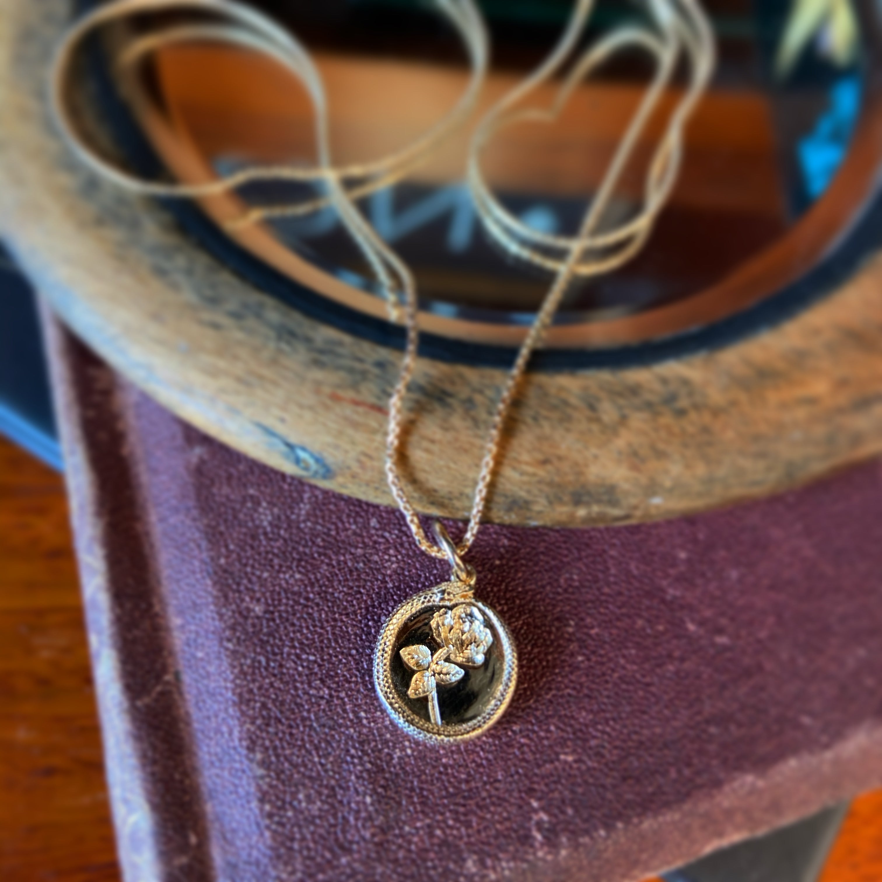Rose Ouroboros Pendant